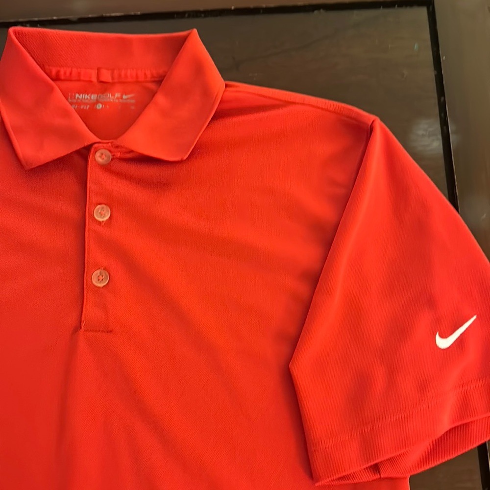 Nike Golf shirt. Worn twice. Great condition. Will ship immediately.